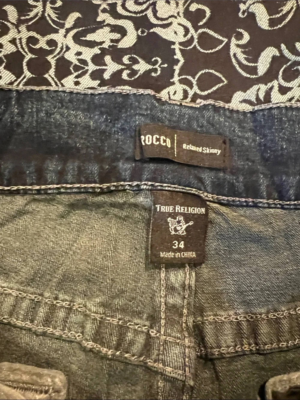 True Religion ROCCO faded dark blue jeans with whiskering
